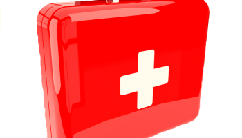 A shiny, bright red pet emergency kit with a white medical cross on the front.